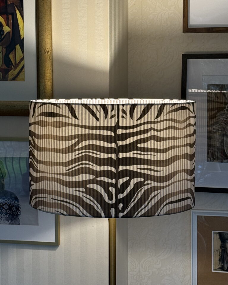 double sided zebra lampshade interior glow by Chantier Studio